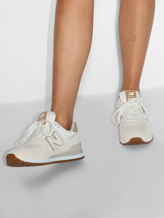 cream colored new balance shoes